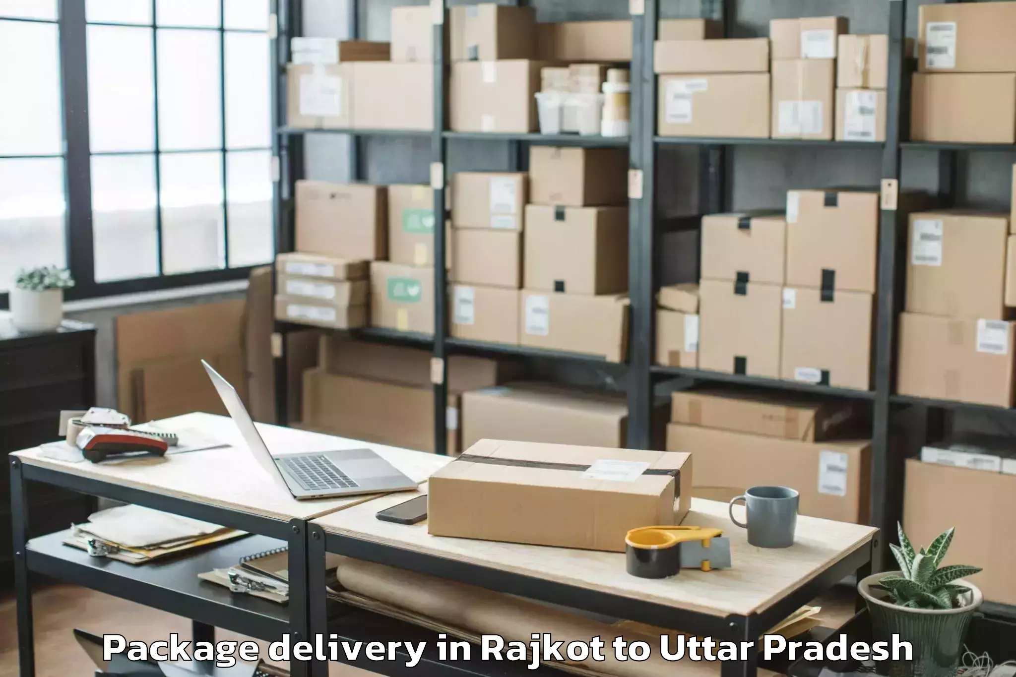 Trusted Rajkot to Dhanghata Package Delivery